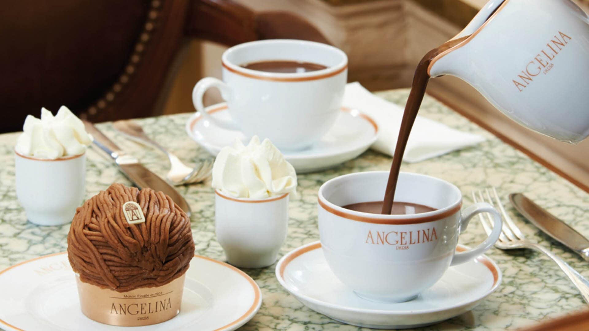 A cup of hot chocolate served with pastries for high tea at Angelina in Singapore, at Marina Bay Sands