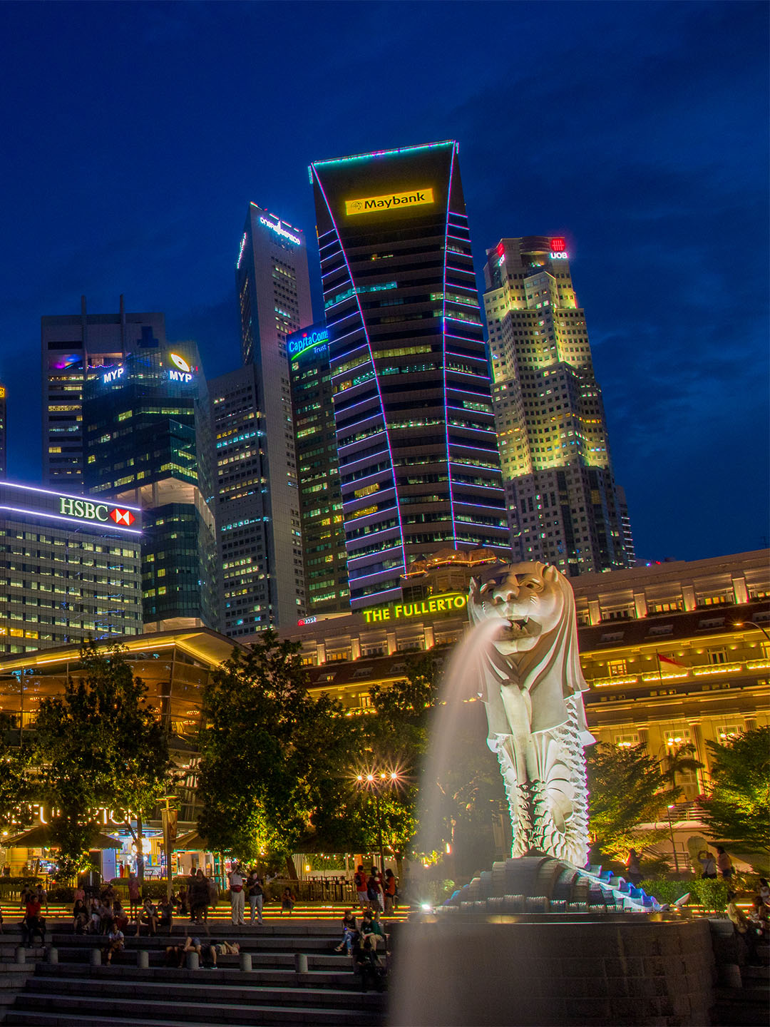 Night view of Marina Bay, Singapore with the iconic Merlion