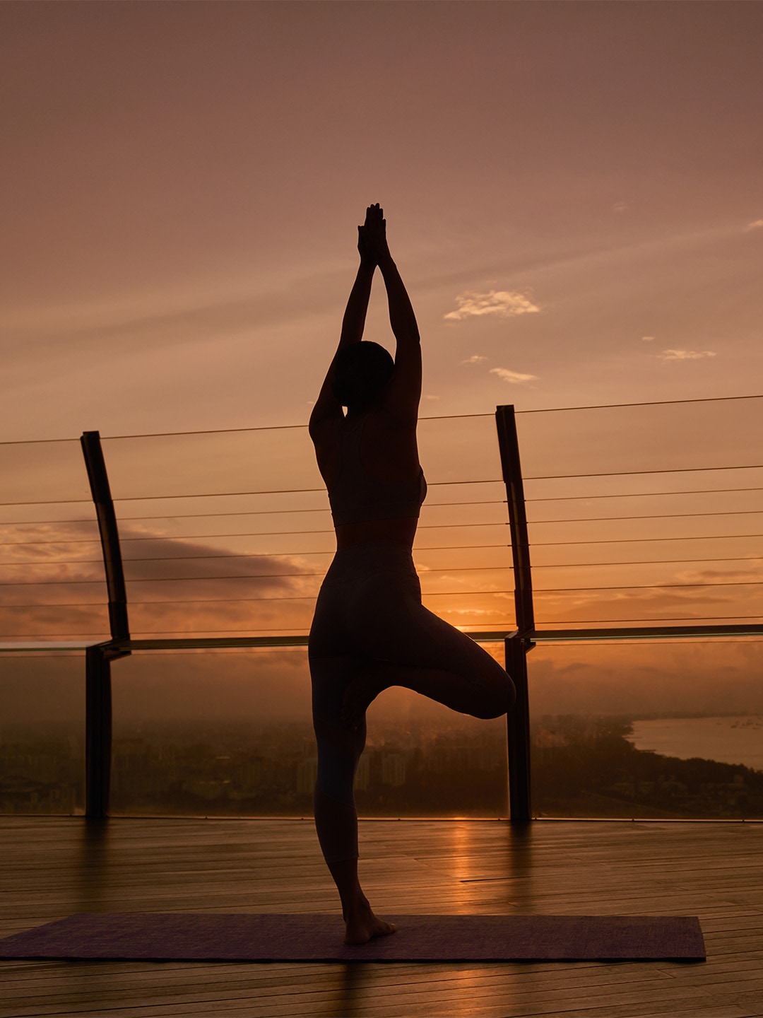 Lady in a yoga position for beauty and wellness treats in Singapore