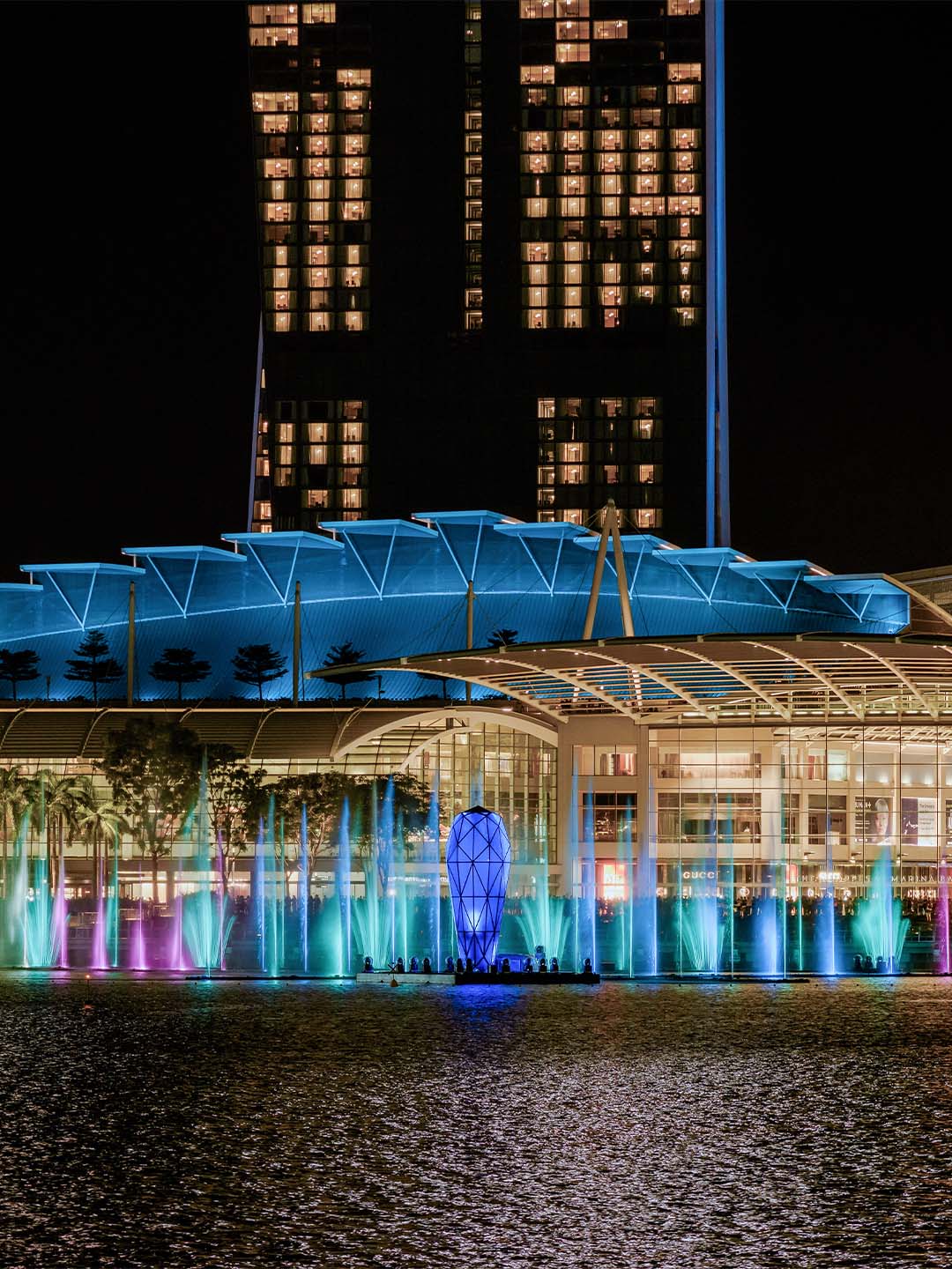 A daily free light and water show, right in front of Marina Bay Sands