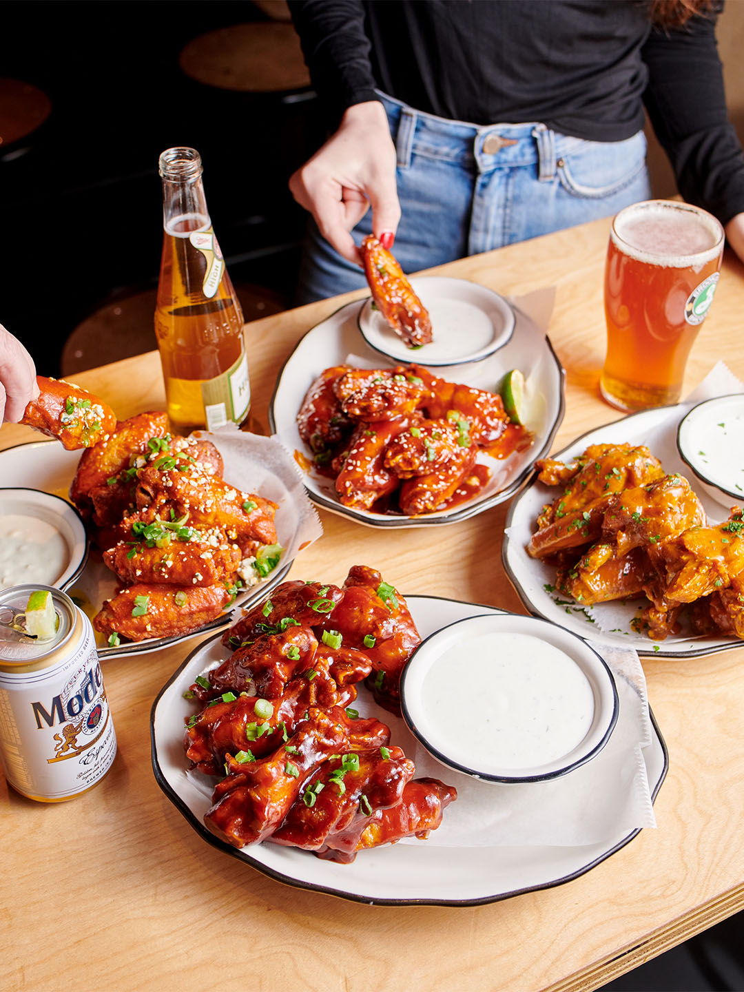 Crispy wings paired with beer at the best casual dining restaurants in Singapore