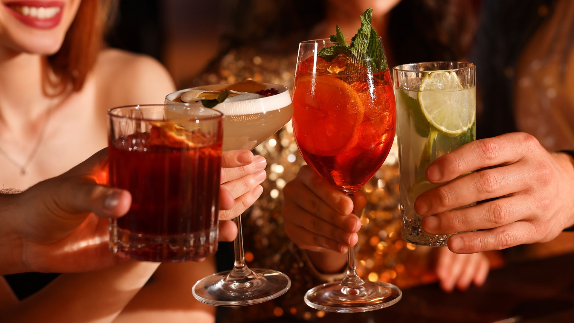 Ladies drinking cocktails at a bar