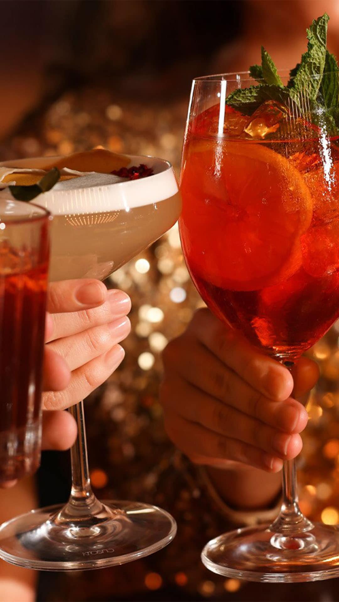 Ladies drinking cocktails at a bar