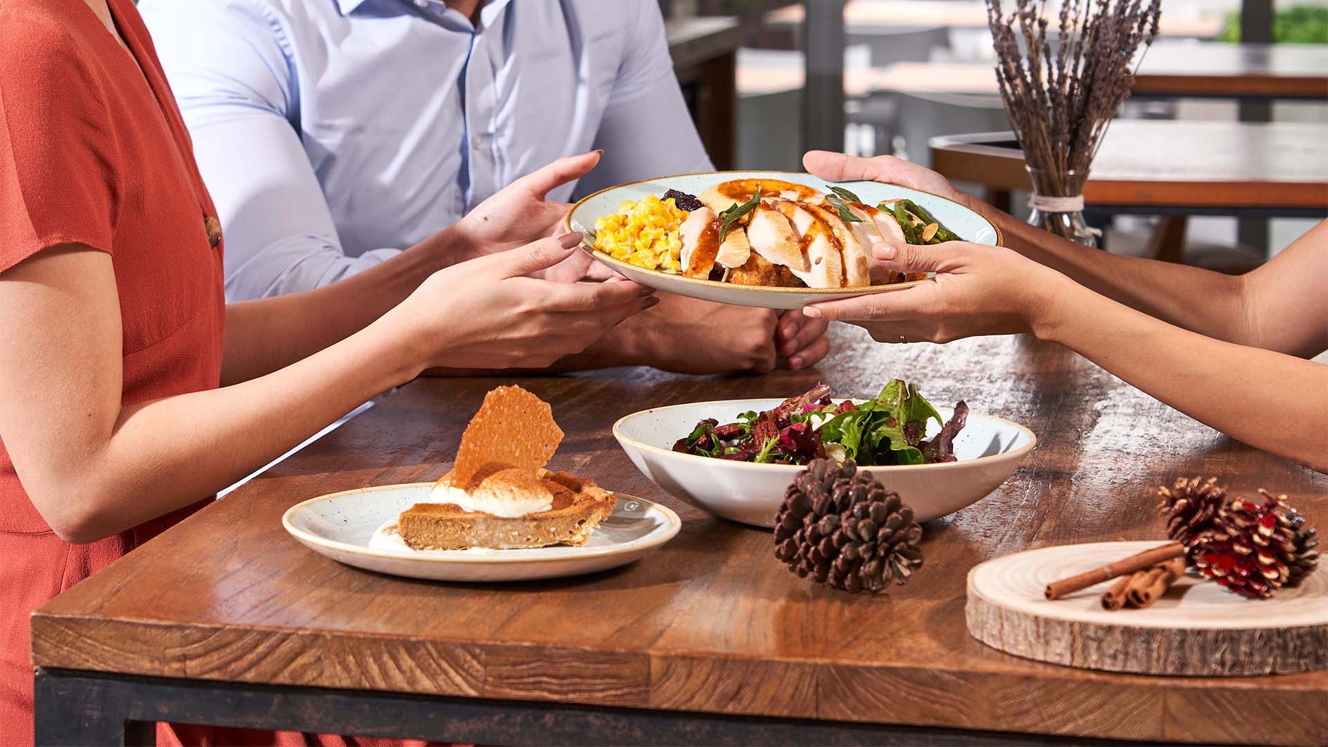 People enjoying Yardbird's 2024 Thanksgiving menu