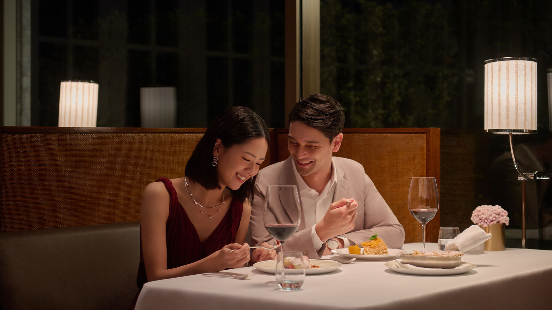 A pair of couple enjoying a romantic Valentine's Day dinner at Spago