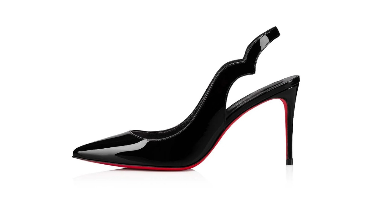 Black women's heels with a red sole, from branded shoe brand, Christian Louboutin