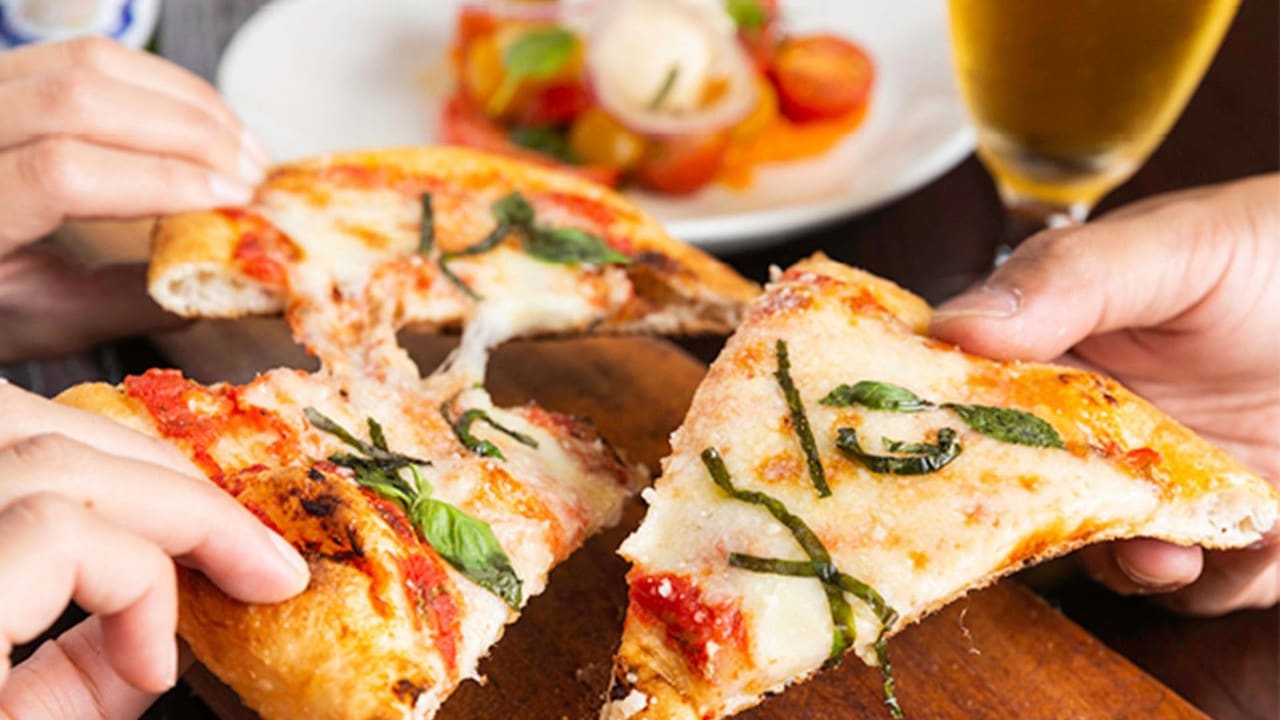 Three slices of pizza at LAVO Italian Restaurant & Rooftop Bar